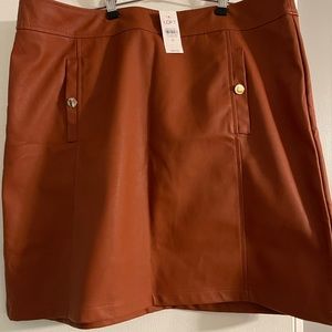 BNWT soft imitation leather skirt in a beautiful mocha color. So in style!